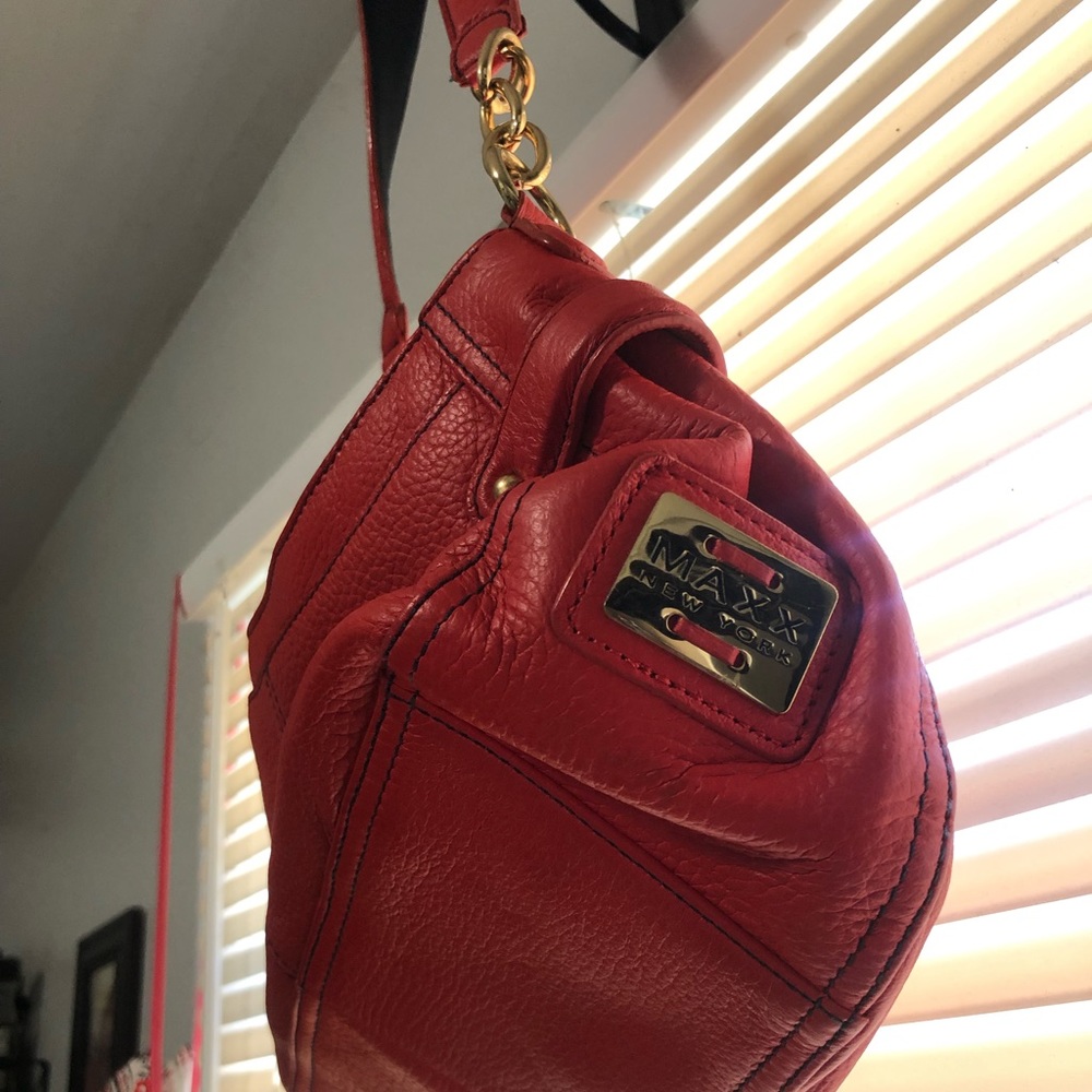 Excellent condition Maxx New York red leather purse.